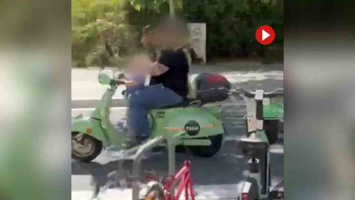 Pillan a una niña conduciendo una moto y el padre mirando el móvil